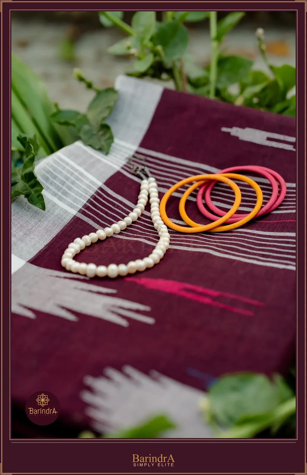 Monipuri Coffee Crimson saree showing the white Moirang Phee temple motif